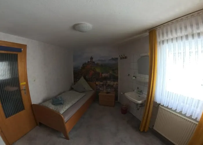 Quarto em Acomodações Particulares Gaestehaus Eulenkoepfchen